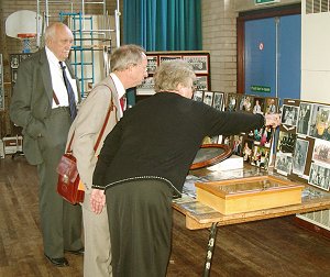 Kath Kiely shows her extensive display of local life to the Mayor while Jim Speakman looks on.
